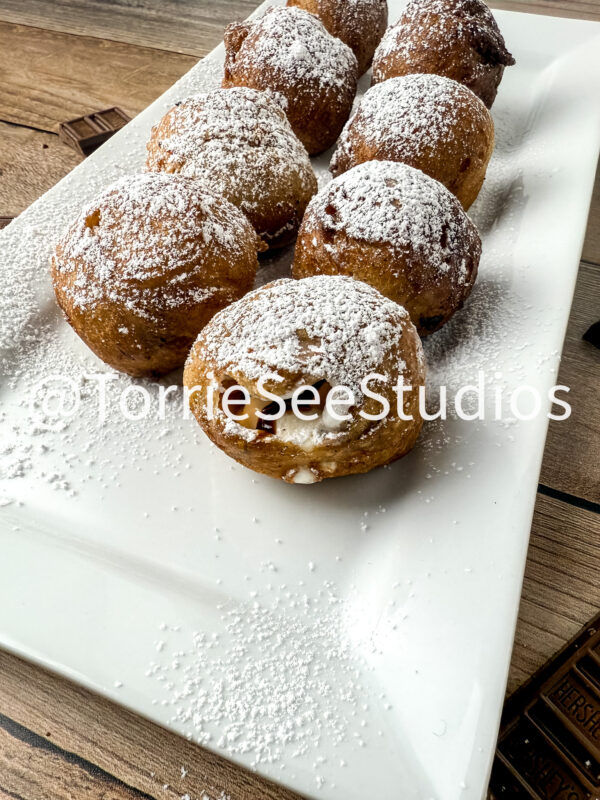 Deep Fried Stuffed Marshmallows on Wood - Image 4