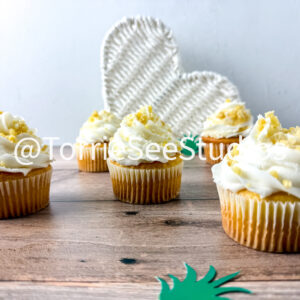 Pineapple Crunch Cupcakes on Wood