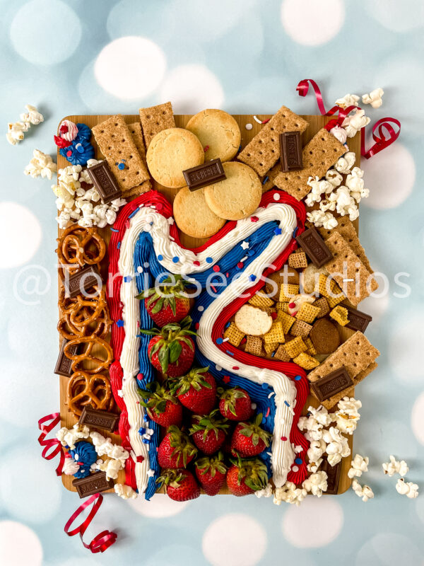 Red White and Blue Buttercream Trail Board on Blue Lights - Image 2