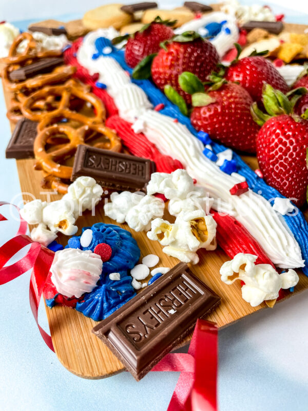 Red White and Blue Buttercream Trail Board on Blue Lights - Image 3