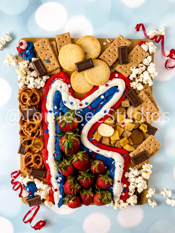 Red White and Blue Buttercream Trail Board on Blue Lights - Image 12