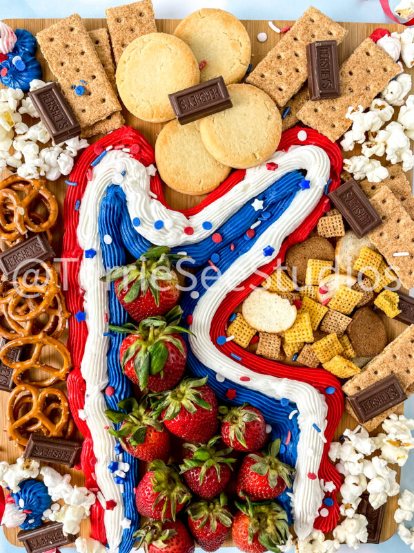 Red White and Blue Buttercream Trail Board on Blue Lights - Image 11