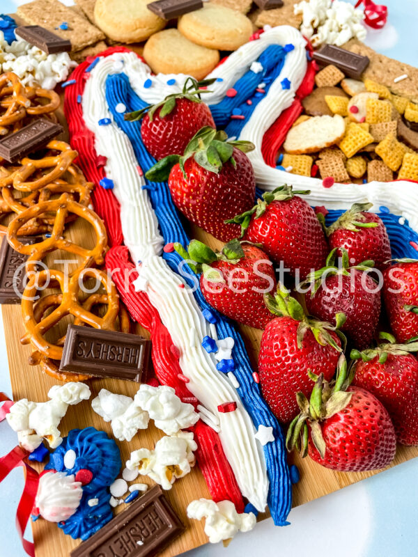 Red White and Blue Buttercream Trail Board on Blue Lights - Image 10
