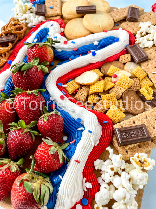 Red White and Blue Buttercream Trail Board on Blue Lights - Image 9