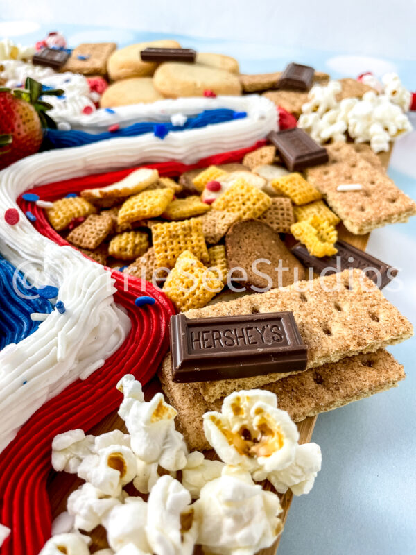 Red White and Blue Buttercream Trail Board on Blue Lights - Image 8