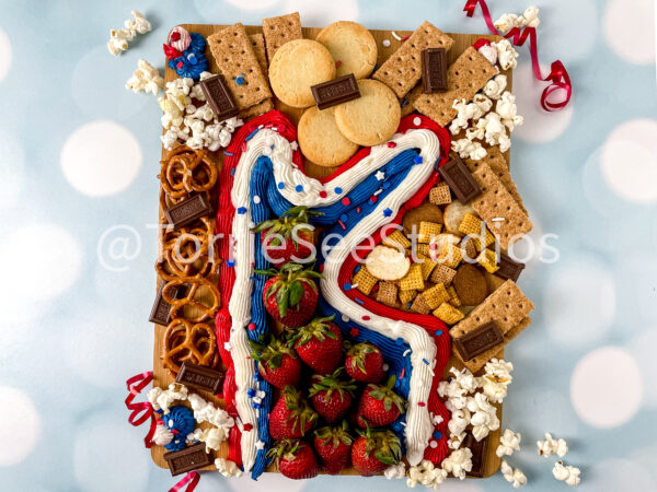 Red White and Blue Buttercream Trail Board on Blue Lights
