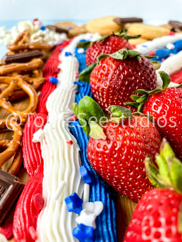 Red White and Blue Buttercream Trail Board on Blue Lights - Image 5