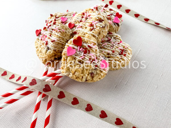Strawberries and Cream Rice Cereal Treats Pops on Linen