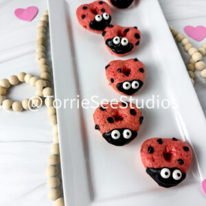 Ladybug Heart Cake Donuts on Sandstone